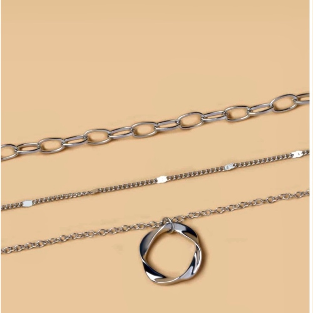 Geometric round charm layered necklace. - Picture 2 of 3